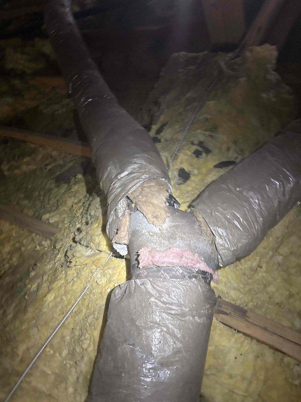 Completed comprehensive ductwork sealing and insulation service in attic space. Sealed all duct connections at boots and plenum, reconnected loose flexible duct run at plenum junction where separation had occurred, and installed additional insulation on exposed ductwork and register eyes. Also installed ceiling saver float switch and secondary drain pan for overflow protection.