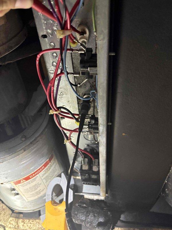 Responded to AC issue with moisture buildup at ceiling access panel and condensation on exterior unit refrigerant line. Performed diagnostic inspection of indoor air handler components, electrical connections, and blower assembly. Documented existing water damage and HVAC system condition for further evaluation of potential drain line obstruction or refrigerant flow issues.