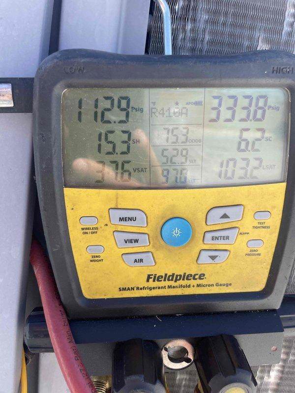 Responded to service call for lobby AC unit that was switching to heat mode overnight and blowing hot air despite manual thermostat adjustments. Connected refrigerant manifold gauges to measure system pressures and temperatures, revealing abnormal superheat and subcool readings indicative of refrigerant flow issues. Diagnosed reversing valve malfunction preventing proper cooling mode operation, causing unit to default to heating cycle regardless of thermostat setting.