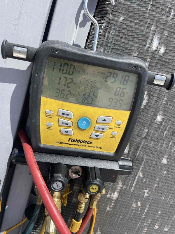 Responded to service call for lobby AC unit that was switching to heat mode overnight and blowing hot air despite manual thermostat adjustments. Connected refrigerant manifold gauges to measure system pressures and temperatures, revealing abnormal superheat and subcool readings indicative of refrigerant flow issues. Diagnosed reversing valve malfunction preventing proper cooling mode operation, causing unit to default to heating cycle regardless of thermostat setting.