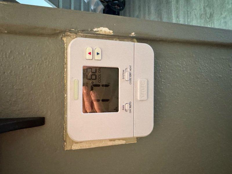 Completed full system installation of a basic 2-ton electric Amana HVAC system utilizing crane assistance for equipment placement. Retained existing ductwork infrastructure to minimize disruption and reduce installation time. Installed new digital thermostat with programmable temperature controls featuring heating, cooling, and fan operation modes. Connected flexible ductwork to new system through floor penetration, ensuring proper airflow distribution throughout conditioned space. All equipment successfully commissioned and operational upon completion, with tenant informed of installation schedule in advance.