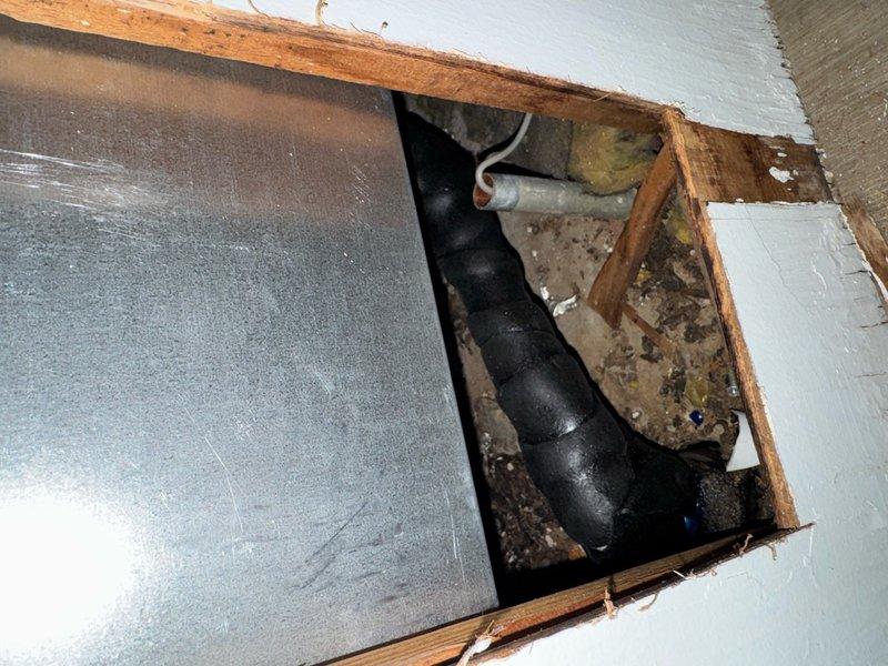 Completed full system installation of a basic 2-ton electric Amana HVAC system utilizing crane assistance for equipment placement. Retained existing ductwork infrastructure to minimize disruption and reduce installation time. Installed new digital thermostat with programmable temperature controls featuring heating, cooling, and fan operation modes. Connected flexible ductwork to new system through floor penetration, ensuring proper airflow distribution throughout conditioned space. All equipment successfully commissioned and operational upon completion, with tenant informed of installation schedule in advance.