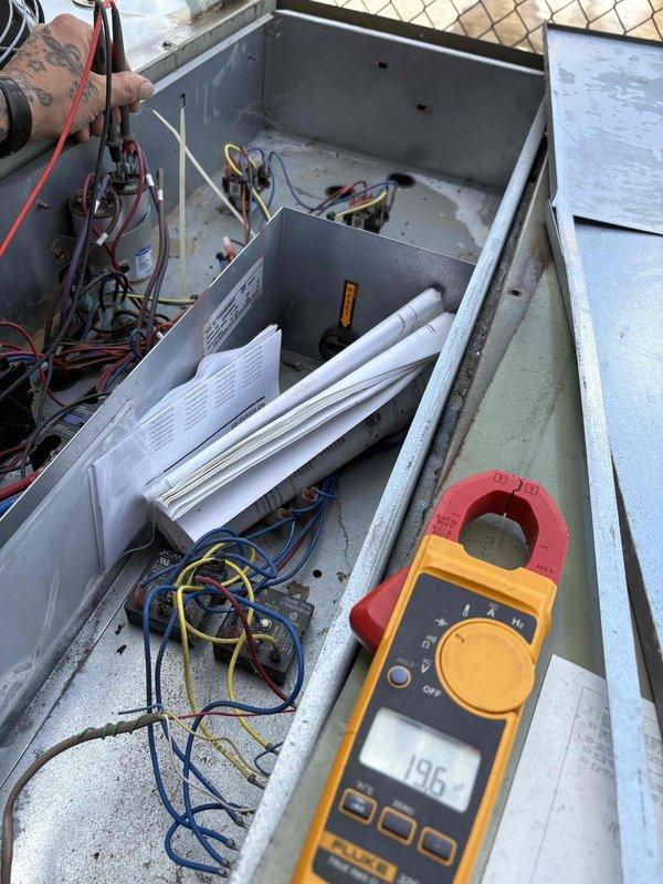 Replaced two 25 MFD capacitors for the condenser fan motors on the right front unit. Obtained the required capacitors and returned to complete the installation, restoring proper operation to the system.