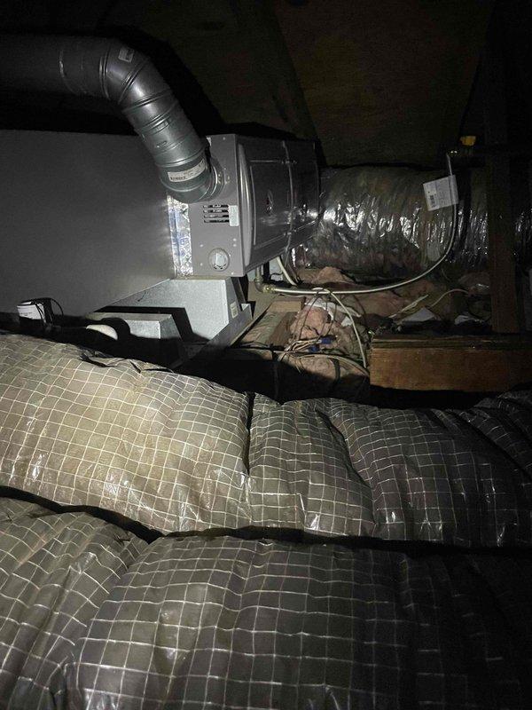 Completed spring preventative maintenance on HVAC system. Performed refrigerant pressure and temperature diagnostics using digital manifold gauge, recording operating pressures of 127 psia on low side and 254 psia on high side with corresponding temperatures of 36°F and 104°F. Inspected air handler unit in crawl space, verified proper operation of equipment, and confirmed adequate insulation materials present. Condenser unit coils found clean with no debris accumulation.