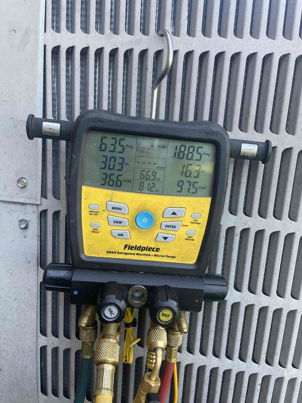 Completed spring maintenance on two HVAC systems in residence. Performed system diagnostics using refrigeration manifold gauges to verify proper refrigerant pressures and temperatures on both units, inspected all mechanical components and utility connections in crawlspace area, and documented equipment conditions through photographic records to ensure both systems are operating within manufacturer specifications for the cooling season.