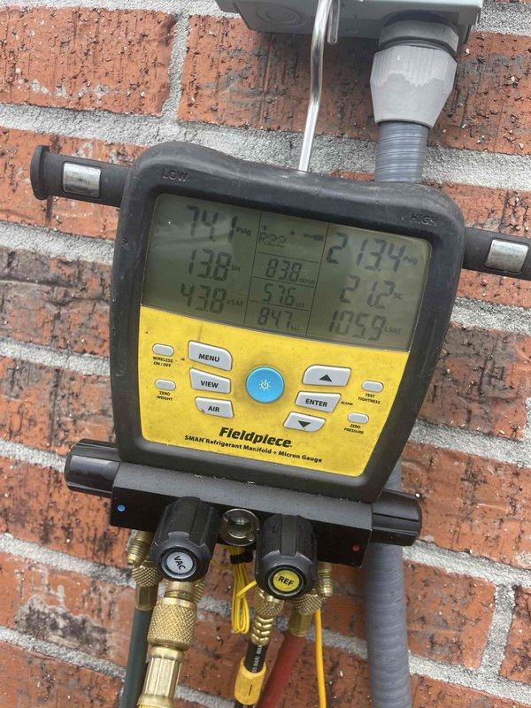 Responded to service call for master bedroom mini-split system not cooling with compressor failing to activate. Upon arrival, performed diagnostic evaluation of the unit and confirmed compressor had begun operating. Utilized digital manifold gauges to measure refrigerant pressures and temperatures, recording superheat and subcooling values to assess system performance. Conducted amperage draw testing on compressor to verify proper electrical operation and rule out potential hard start or capacitor issues. System found operating within normal parameters at time of inspection, with compressor running and unit cooling effectively.