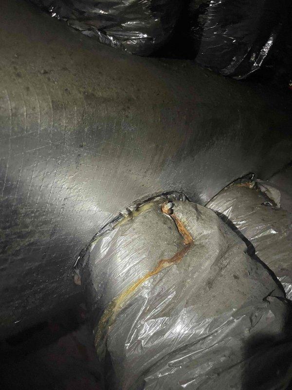 Completed spring maintenance on a 9-year-old gas HVAC unit, including electrical diagnostics with amperage readings at 136A AC and capacitor inspection. Replaced air filter with customer-supplied unit and documented damaged ductwork insulation showing deterioration and separation of outer metallic layer in the crawl space area.