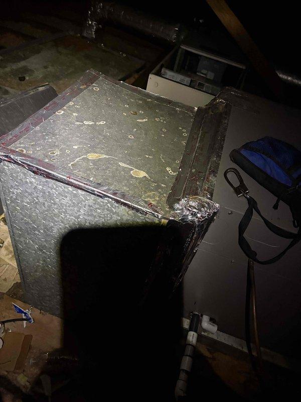 Responded to service call for frozen AC unit. Upon arrival, confirmed unit had been turned off by customer after freezing incident occurred the previous night. Inspected air handler in attic space and assessed system condition. Instructed customer to switch thermostat to fan-only mode to facilitate thawing of evaporator coil while keeping cooling function disabled to prevent further freezing and potential compressor damage.