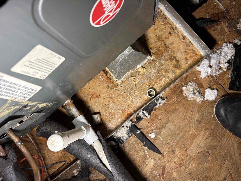 Completed comprehensive spring maintenance on single-system HVAC unit with Rheem air handler located in attic space. Performed standard seasonal inspection including filter check, electrical connections verification, refrigerant line inspection, condensate drain evaluation, and visual assessment of all accessible components and ductwork, with photographic documentation of equipment condition and installation area.