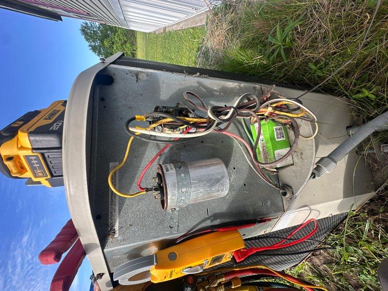 Completed spring maintenance on residential AC unit. Performed comprehensive system inspection with top cover removed, tested electrical components including capacitor and motor assembly, verified all wire connections, and conducted diagnostic testing using professional HVAC meters to ensure optimal system performance for the cooling season.