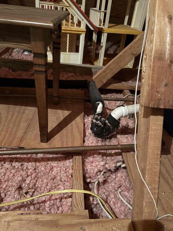 Completed annual cooling maintenance on residential HVAC system. Inspected air handler unit in attic space, verified proper operation of all mechanical components, and checked ductwork connections for secure attachment and adequate insulation integrity. Examined condensate drain line assembly with PVC piping, confirmed proper drainage flow and trap configuration to prevent system overflow. All equipment found operating within normal parameters with no immediate service needs identified.