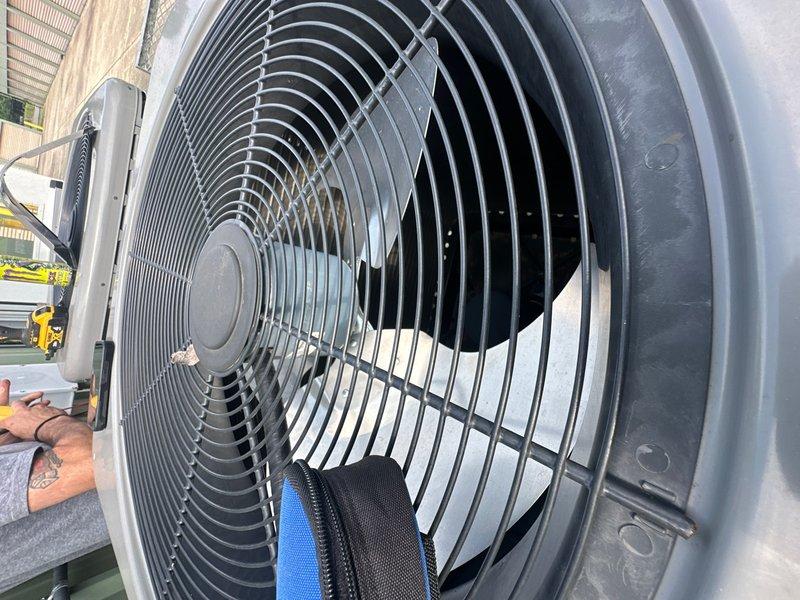 Completed real estate inspection on five HVAC units across multiple storage facility zones, including two office units and three climate-controlled storage units. Performed diagnostic assessment of rooftop equipment, inspecting fan motor assemblies and testing battery backup systems in control panels. Documented equipment conditions with photographs for property evaluation purposes.