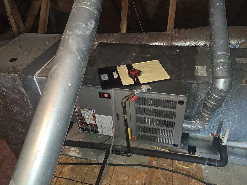 Completed comprehensive HVAC system evaluation for residential property. Inspection included attic-mounted air handler unit with associated ductwork and exterior condenser unit. Documented current equipment condition, refrigerant line routing, electrical connections, and overall system configuration to provide accurate replacement estimate.