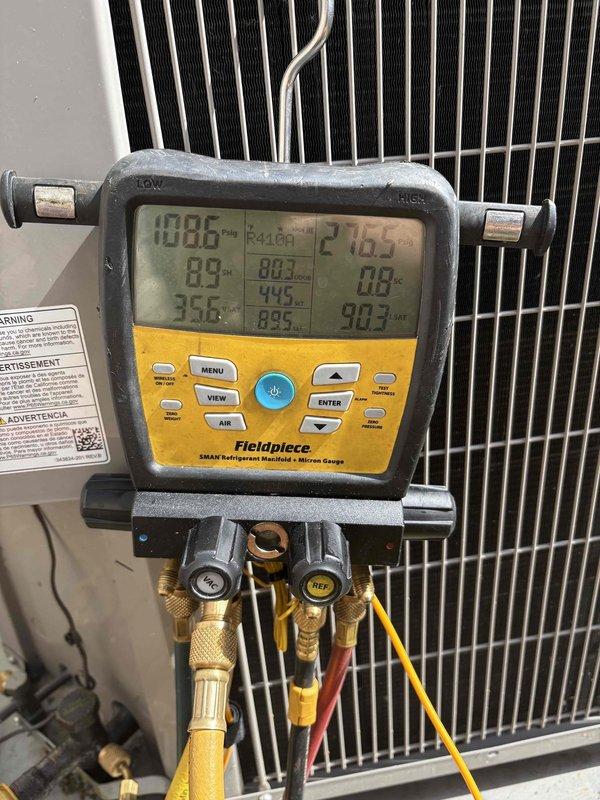 Replaced defective thermal expansion valve (TXV) and liquid line filter drier under warranty on HVAC system. Retrieved replacement parts from Carrier supply house and performed complete component installation. Verified proper system operation using Fluke 325 clamp meter to confirm electrical readings of 9.70 amps and Fieldpiece SMAN manifold gauge set to monitor refrigerant pressures and temperatures throughout the process. System tested and operating within manufacturer specifications upon completion.