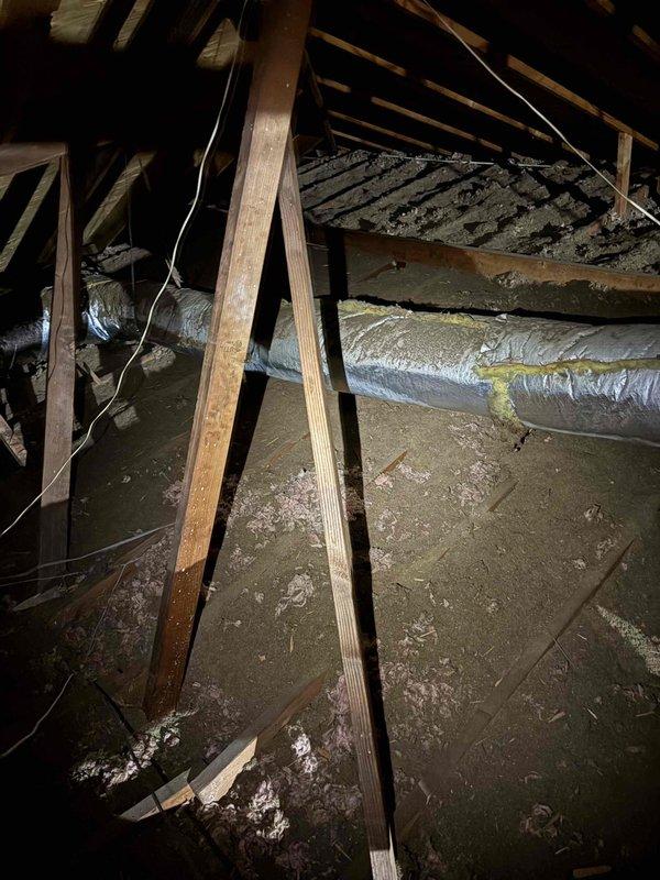 Completed AC summer membership maintenance inspection in attic space. Inspected HVAC ductwork system, including flexible metallic ducting and insulation wrapping for proper condition and secure connections. Verified air handler components accessible through attic space were operating within normal parameters and confirmed electrical wiring routing was properly secured to structural members.