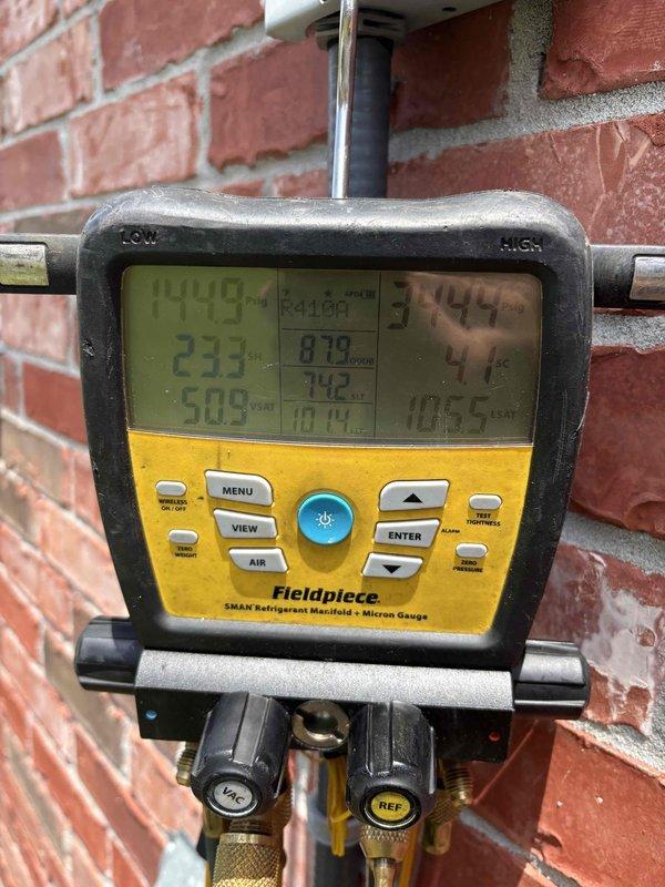 Responded to emergency service call for non-operational AC unit displaying 85°F on thermostat. Performed diagnostic evaluation of system including electrical components, contactor relay, and refrigerant pressures using manifold gauges. Completed membership maintenance inspection, verified system operation, and discussed thermostat replacement options with member.