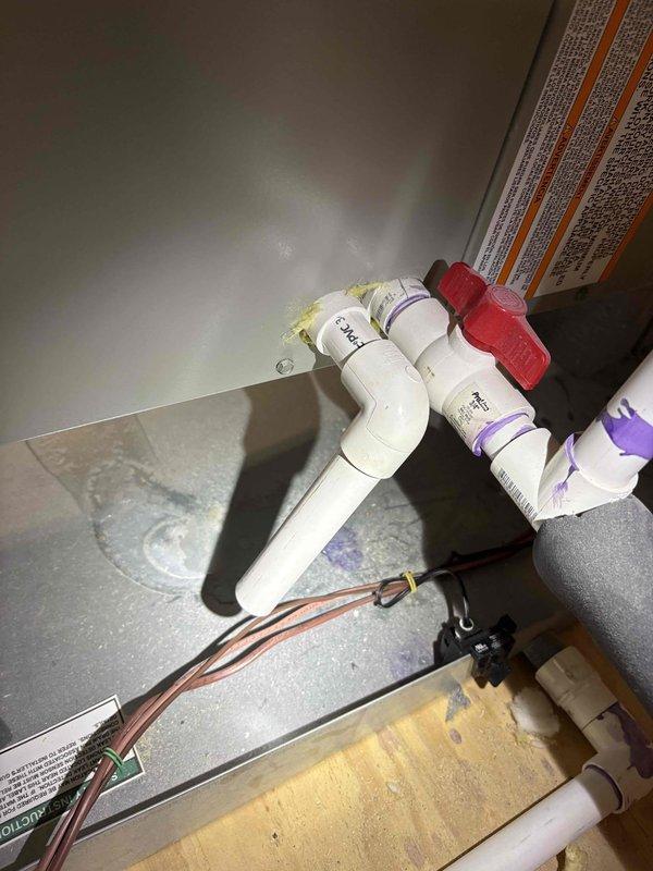 Completed comprehensive inspection and cleaning of two commercial Trane HVAC systems. During inspection, identified significant frost and ice accumulation on air handler unit indicating potential refrigerant flow issues, airflow restriction, or thermostat malfunction. Performed diagnostic evaluation of affected unit, inspecting evaporator coil, refrigerant lines, condensate drain system, and associated piping components including PVC drainage with ball valve shut-off. Conducted additional diagnostic work on cooling system to determine root cause of icing condition and assess overall system performance. Cleaned accessible components and documented equipment condition with photographic evidence for maintenance records.