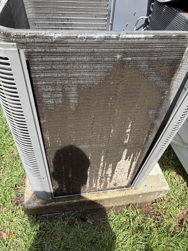 Completed routine maintenance and inspection on residential HVAC system for new homeowner unfamiliar with equipment. Documented system information and captured photographs of attic-mounted furnace installation and outdoor condensing unit. Observed heavy accumulation of dirt and debris on condenser coil fins requiring attention. Corrected air filter placement issue and provided guidance on proper filter location. Discussed preventative maintenance program benefits with homeowner for future consideration.