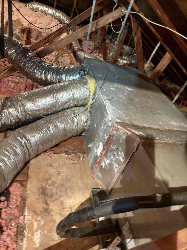 Responded to no-power complaint on 2019 Carrier 3-ton system with 2-stage compressor and 2-stage fan. Customer reported AC failed to restart after power was disconnected three times during plumbing work to relocate sewer drains in 60-year-old home. Performed diagnostic inspection and confirmed no power present at thermostat. Inspected attic-mounted air handler, ductwork, and associated electrical components. System components showed age-appropriate wear consistent with attic environment installation. Identified power loss issue related to multiple power interruptions during concurrent plumbing modifications.
