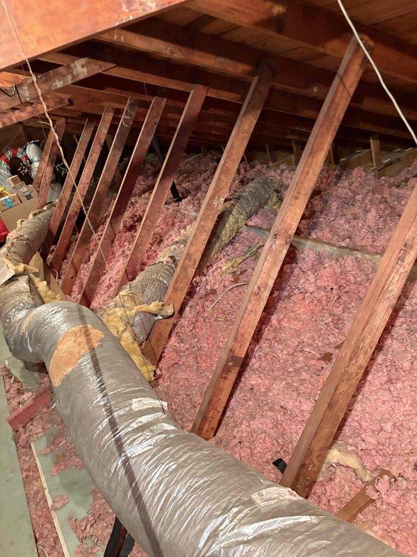 Responded to no-power complaint on 2019 Carrier 3-ton system with 2-stage compressor and 2-stage fan. Customer reported AC failed to restart after power was disconnected three times during plumbing work to relocate sewer drains in 60-year-old home. Performed diagnostic inspection and confirmed no power present at thermostat. Inspected attic-mounted air handler, ductwork, and associated electrical components. System components showed age-appropriate wear consistent with attic environment installation. Identified power loss issue related to multiple power interruptions during concurrent plumbing modifications.