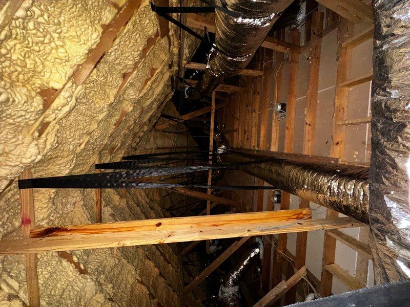 Completed installation of Amana 4-ton gas system with comprehensive ductwork routing through attic space. Installed and properly sealed all registers, secured flexible metallic ductwork with appropriate support brackets, and applied spray foam insulation between wall studs. Adjusted secondary drain line to discharge into emergency drain pan and repositioned float switch to lowest point of system for proper operation. Completed final quality control inspection including thermostat plate installation, equipment labeling, retrieval of extension cords and fans from attic and bathroom areas, verified all ductwork connections were sealed, and obtained required manufacturer warranty documentation before confirming customer satisfaction with completed installation.