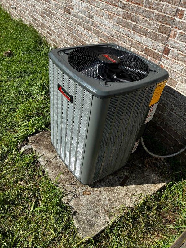 Completed installation of 3-ton condenser unit on exterior concrete pad with proper electrical connections and refrigerant lines. Integrated new outdoor unit with existing ductwork system in attic space, including flexible duct connections and metal transition pieces to ensure proper airflow distribution throughout the structure.