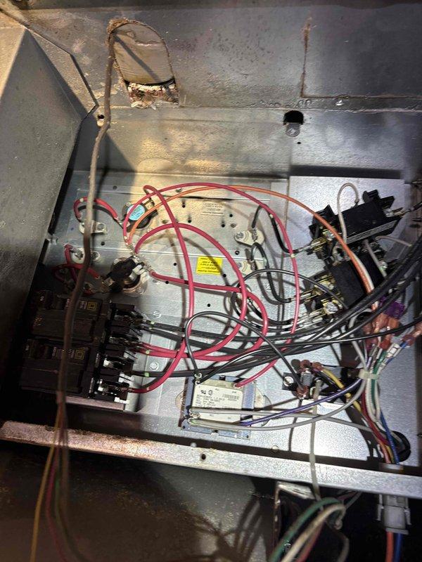 Completed standard AC system inspection including examination of electrical control panel and verification of all major components. Inspected contactor, circuit breakers, capacitor, and control wiring for proper operation and connections. Accessed crawl space to verify refrigerant lines and condensate drainage. System operating within normal parameters. Customer enrolled in membership program for ongoing maintenance coverage.