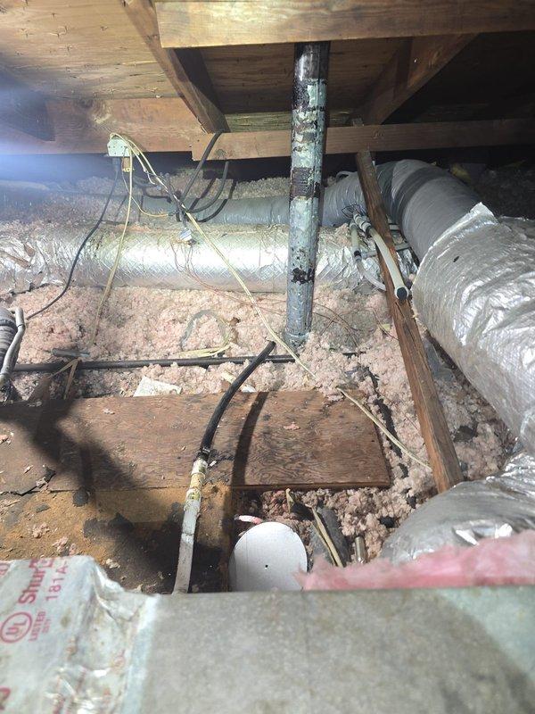 Completed comprehensive estimate for full HVAC system replacement of failed 4-ton unit. Existing system deemed non-operational and beyond economical repair. Documented current attic installation conditions including deteriorated flexible ductwork, compromised insulation coverage, and outdated equipment configuration to provide accurate replacement specifications and scope of work required.