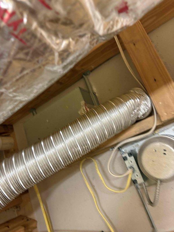 Completed comprehensive inspection of three HVAC systems: master bedroom 2-ton unit, living room 4-ton unit, and upstairs 2-ton unit. All systems were found to be operating within normal parameters with no mechanical deficiencies noted. Verified proper operation of compressors, air handlers, refrigerant pressures, and airflow on all three units.

Inspected upstairs bathroom exhaust vent ducting in response to minor mold concerns identified during home inspection. Confirmed vent ductwork is properly installed and terminates to building exterior as required by code. Flexible aluminum ductwork observed in attic space shows proper support, secure connections, and adequate insulation. No disconnections, improper terminations, or code violations were identified. Mold occurrence appears related to inadequate ventilation fan usage during bathroom use rather than any mechanical deficiency.

Replaced three 12x12x1 air filters on the upstairs 2-ton system as requested. Confirmed the two other sys