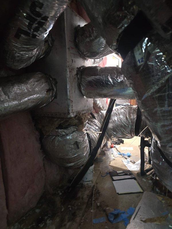 Completed comprehensive estimate for ductwork replacement in residential attic space. Documented existing HVAC system showing deteriorated air handler unit with significant rust and corrosion, along with heavily soiled flexible ductwork exhibiting accumulated dust, dirt, and compromised insulation integrity throughout the installation.