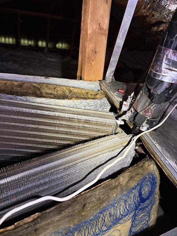 Completed comprehensive system cleaning and inspection on vacant property. Return grille was found heavily soiled and cleaned thoroughly. Air filter was inspected and showed signs of extended use without replacement. During attic inspection, discovered significant condensation accumulation on supply ductwork and moisture saturation in surrounding fiberglass insulation, indicating potential humidity control issues or inadequate duct insulation. All findings documented with photos for property preparation prior to market listing.