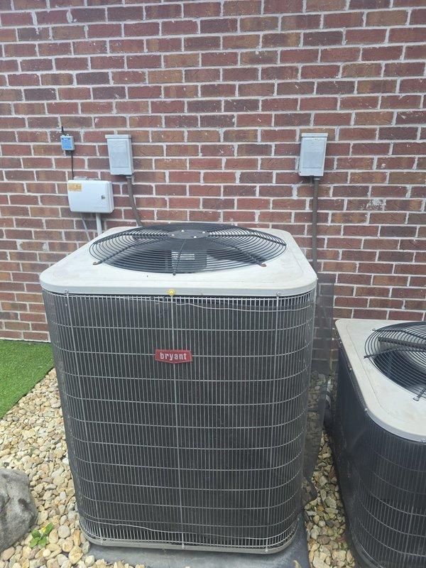 Conducted comprehensive estimate for complete HVAC system replacement on residential property. Inspected existing Bryant condenser unit located on exterior gravel pad against brick wall with proper electrical disconnects and service boxes in place. Evaluated attic-mounted air handler and ductwork system, noting current configuration with flexible duct runs and insulation. Customer reported suspected evaporator coil leak based on third-party assessment. Documented existing equipment conditions through photographic evidence and provided replacement system options to address reported refrigerant leak issue.