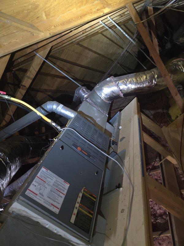Performed comprehensive diagnostic and repair on two separate HVAC systems. On the primary system, replaced failed 50/5 dual run capacitor and conducted refrigerant leak search, identifying a major leak in the evaporator coil with visible oil residue in the primary drain pan. Added 3 lbs of 410a refrigerant to restore proper charge levels. On the secondary bedroom system, replaced failed condenser fan motor on the R22 unit and cycled system to verify operation. Both systems showed signs of recurring refrigerant loss despite recent service history, with the evaporator coil leak requiring equipment replacement consideration. Provided consultation on replacement options and system upgrade recommendations given the age and condition of existing equipment, particularly noting the compromised evaporator coil and ongoing refrigerant loss issues on both units.