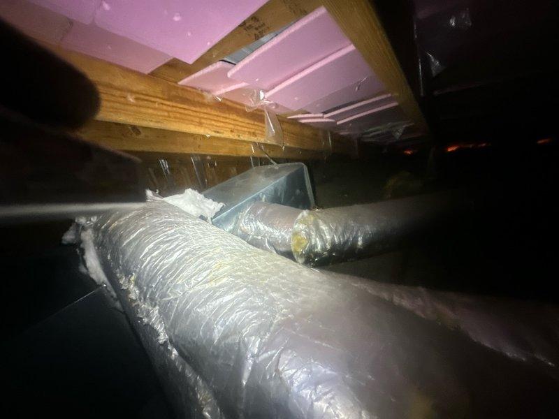 Responded to callback for upstairs HVAC unit failing to reach setpoint, with thermostat set at 75°F but space temperature holding at 80°F. Performed diagnostic assessment including airflow measurements at return air vent and inspected ductwork system in attic space. Technician dispatched same day to investigate temperature differential and system performance issues.