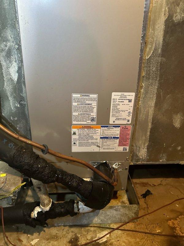 Completed comprehensive maintenance service on two HVAC systems, including one indoor air handler unit located in the attic and one outdoor condensing unit. Performed thorough cleaning and detailed inspection of both systems to ensure optimal performance and efficiency. The indoor unit, a large cabinet-style air handler with refrigerant lines and copper piping, was inspected for proper operation, and all connections were verified secure. The outdoor unit, Model 24APB6E60A300 (5-ton capacity, 208-230V, single-phase), was cleaned and inspected, with all electrical specifications and safety parameters confirmed within manufacturer guidelines. Both systems are operating properly and ready for continued service.