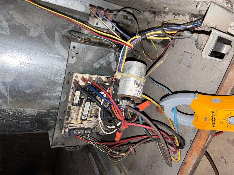 Performed comprehensive maintenance inspection on aging air conditioning unit with customer concerns regarding rattling noise and unit age assessment for property sale. Conducted thorough system evaluation including electrical components, capacitor testing, and internal component inspection. Cleaned condenser unit, checked all electrical connections and terminal blocks, verified capacitor functionality, and inspected wiring integrity throughout the system. Assessed overall unit condition and documented findings with detailed photographs of electrical panel, capacitor assembly, and internal components. Unable to determine exact unit age due to faded model and serial number plate. Identified rattling noise source and evaluated system performance. Provided customer with detailed assessment of current unit condition and recommended repairs needed for optimal operation.