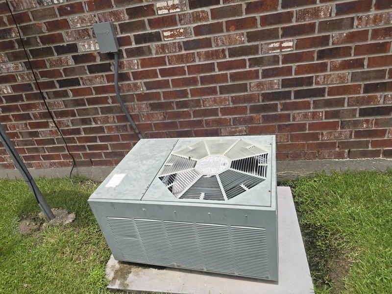 Conducted comprehensive HVAC system evaluation of residential installation including attic-mounted air handler with metal ductwork and exterior condensing unit. Documented existing equipment condition, insulation placement, and outdoor unit positioning on concrete pad adjacent to structure. Photographed system components to provide estimate for requested work per lead specifications.
