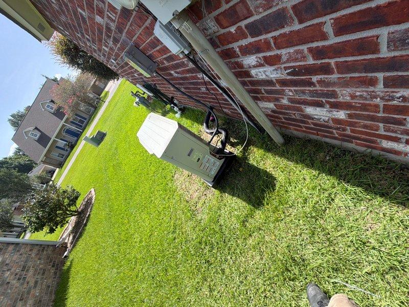 Completed warranty replacement of residential HVAC system, removing existing 4-ton unit and installing new 3-ton Amana system. Air handler was positioned in attic space with proper ductwork connections utilizing flexible metallic ducting. Outdoor condenser unit was installed on ground level against brick exterior wall. All electrical connections, refrigerant lines, and condensate drainage were properly configured. System was tested for proper operation and all warranty documentation was obtained prior to departure. Equipment had been pre-delivered to shop for staging prior to installation.