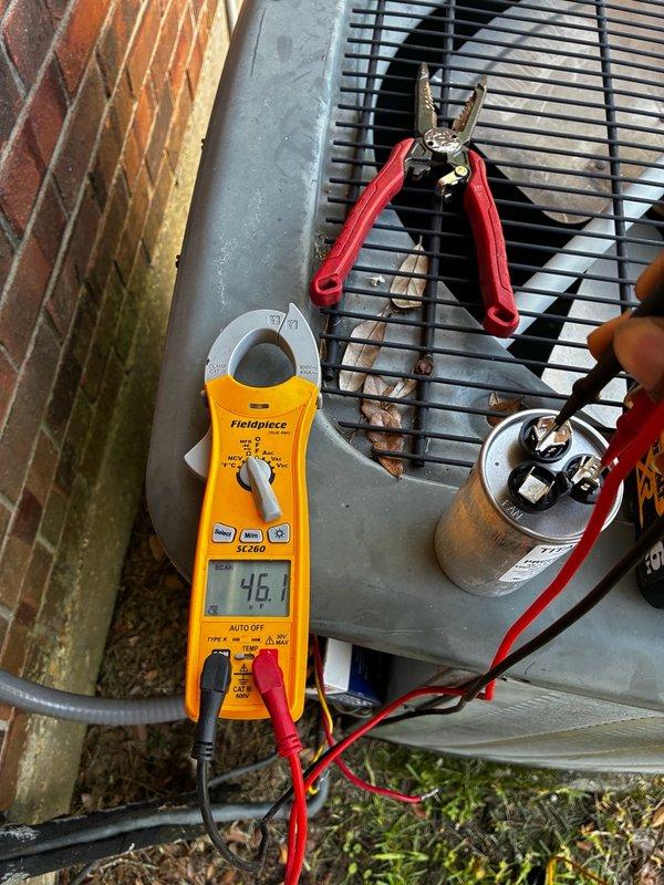 # Dispatch - After Hours

Responded to no cooling complaint on residential HVAC system. Upon arrival, performed diagnostic testing on outdoor condensing unit using digital manifold gauges and clamp meter. Measured operating amperage at 46 amps and recorded system pressures and temperatures. Testing revealed failed run capacitor on compressor circuit. Replaced defective capacitor with new component, verified proper electrical connections, and confirmed system returned to normal cooling operation with appropriate refrigerant pressures and temperatures.