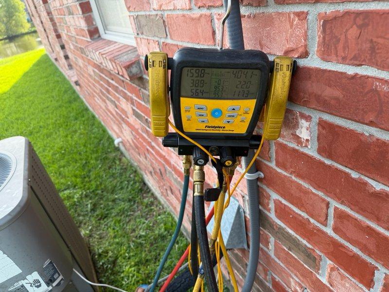 Responded to warranty callback for AC system previously serviced for failed motor and compressor diagnosis. Upon arrival, performed comprehensive system diagnostics using digital manifold gauges to measure refrigerant pressures and temperatures on outdoor condensing unit. Verified operation of recently replaced motor and conducted compressor performance testing to determine root cause of system failure and validate previous diagnosis against second opinion findings.