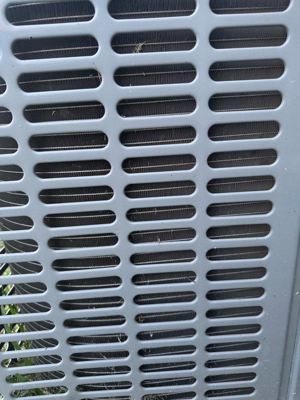 Responded to after-hours emergency call for residential air conditioning system that experienced loud noise at 4am followed by loss of airflow despite unit continuing to run. Upon arrival, performed visual inspection of outdoor condenser unit and indoor air handler components. Examined condenser coil fins and protective grille panel, confirming no visible damage or debris obstruction. Inspected electrical control panel and wiring connections for signs of failure or loose connections that could have caused reported noise. Documented equipment condition through photographs for warranty claim processing. Unit had been shut off by customer with only fan operating since initial incident. Verified system status and provided recommendations for further diagnostic testing during regular business hours to identify root cause of loud noise and airflow loss.