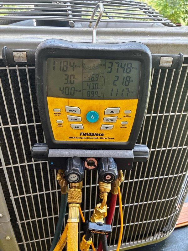 Completed warranty replacement of failed condenser fan motor on HVAC unit. Installed new motor and replaced dual-run capacitor (70/5μF 440VAC) to ensure proper system operation. Verified all electrical connections, tested system pressures and temperatures using refrigerant manifold gauges, and confirmed unit operating within normal parameters. System returned to full operational status.