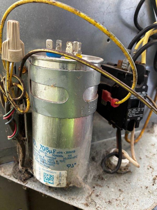 Completed warranty replacement of failed condenser fan motor on HVAC unit. Installed new motor and replaced dual-run capacitor (70/5μF 440VAC) to ensure proper system operation. Verified all electrical connections, tested system pressures and temperatures using refrigerant manifold gauges, and confirmed unit operating within normal parameters. System returned to full operational status.