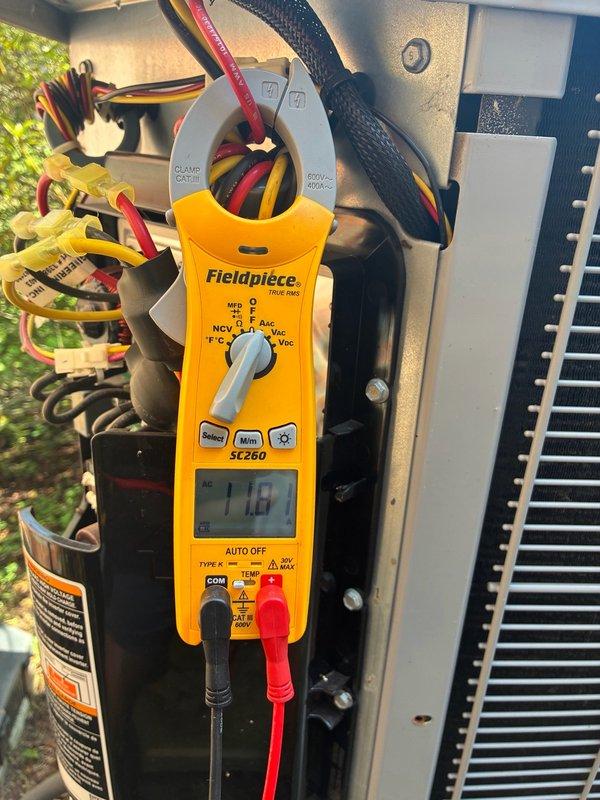 Completed annual cooling maintenance on two HVAC systems as scheduled. Performed comprehensive electrical diagnostics using clamp meter to verify proper amperage draw and system operation. Utilized digital manifold gauges to measure refrigerant pressures and temperatures, confirming both systems operating within manufacturer specifications. Inspected condensate drain lines and addressed customer concern regarding condensation dripping from two supply registers; verified proper airflow and insulation at affected locations. All electrical connections tested and found secure. Systems running efficiently with no deficiencies noted.
