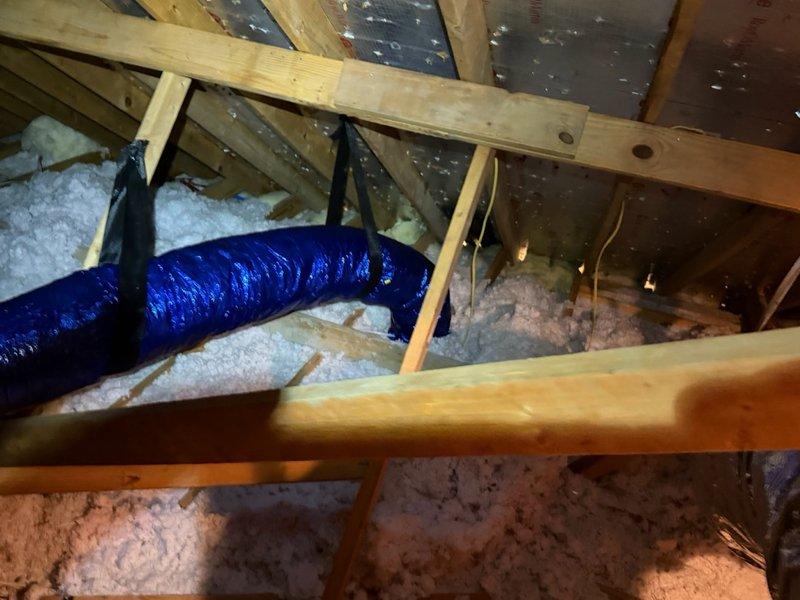 Completed comprehensive HVAC system upgrade including full ductwork replacement with antimicrobial materials throughout attic space. Removed existing duct system and installed new plenum with upgraded supply runs to two bedrooms, upsizing to 12x6x8 supply boxes with 8-inch flex duct. All remaining supply runs installed with 7-inch flex duct. Connected existing 7-inch bathroom duct stub protruding into attic to proper 7-inch supply line for complete integration.

Replaced existing condenser unit with new 1.5-ton condenser, including refrigerant line connections and electrical hookup. Adjusted blower speed settings on air handler to match new condenser specifications for optimal system performance. Replaced customer-supplied Mr. Cool mini-split condenser unit with proper refrigerant line connections.

Performed extensive insulation upgrades on exterior refrigerant line sets for all five HVAC units on property, removing deteriorated insulation and installing new line set insulation to pre