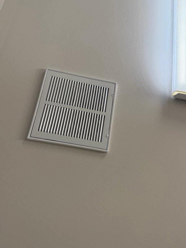 Completed HVAC installation including cutting and installing flexible ductwork for multiple supply runs in attic space with proper support strapping and fasteners. Installed remote return air vent with grille cover, ensuring proper airflow integration with existing system.