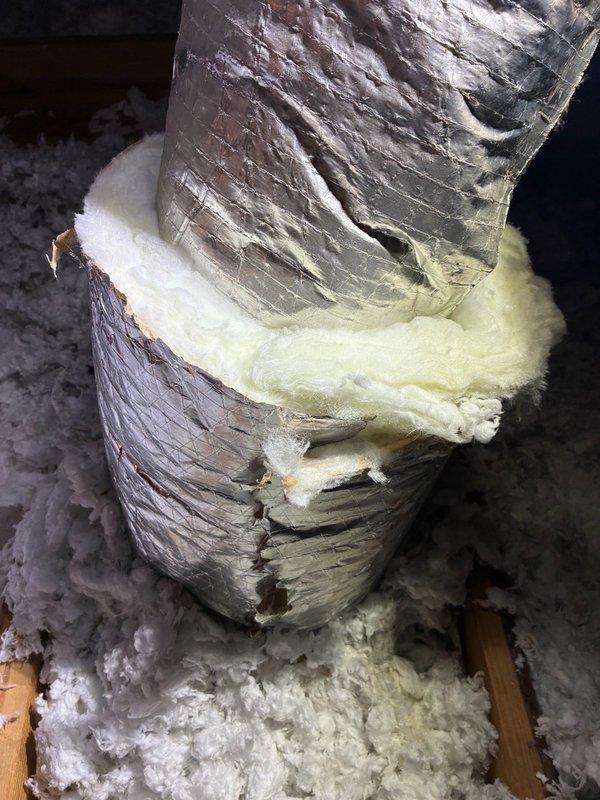 Responded to Ion Service Alert indicating serious equipment issue on north end system. Inspected HVAC system and verified thermostat operation showing 72° room temperature with system in auto mode, heating setpoint at 69° and cooling setpoint at 75°. Located and sealed two ductwork connections in attic space as previously identified, applying proper insulation wrap to corrugated flex duct joints to prevent air leakage and maintain system efficiency.
