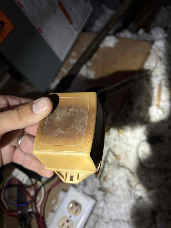 Responded to emergency service call regarding HVAC system fire incident. Customer reported system caught fire and fire department was dispatched to residence. Upon arrival, conducted thorough inspection of system installed in 2016 to identify burnt wiring or electrical failure points. Inspected control board and electrical components in mechanical room, examining for signs of thermal damage, arcing, or wire insulation failure. Documented condition of system components with photographs. Assessed ductwork and attic installation area for additional fire damage or compromised wiring. Investigation focused on locating source of electrical failure that caused fire event to ensure system safety before any restoration work could proceed.