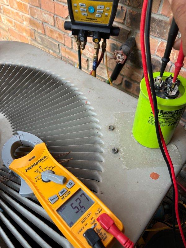 Responded to service call for 20-year-old AC system not cooling and producing humming noise while blowing warm air. Performed comprehensive system inspection including attic ductwork evaluation and outdoor condenser unit diagnostics. Utilized clamp meter and manifold gauge set to test electrical amperage and refrigerant pressures. Found compromised flexible ductwork in attic with deteriorated outer layer and disturbed insulation. Tested condenser unit functionality and electrical components. Documented system conditions and presented customer with repair versus replacement options based on unit age and current performance issues.