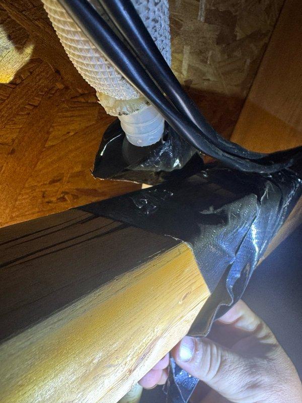 Responded to water leak complaint from attic-mounted mini split system serving game room. Upon inspection, identified condensate drainage issue causing water intrusion and damage to interior wall. Documented existing plumbing installation including PVC drain lines, refrigerant line set with insulation, and electrical wiring. Assessed condensate management system and wall damage extent. Photographed rough-in plumbing work, framing, and HVAC installation for documentation and further remediation planning.